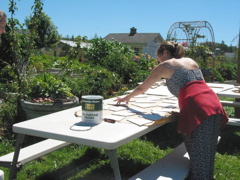 Artist painting tiles