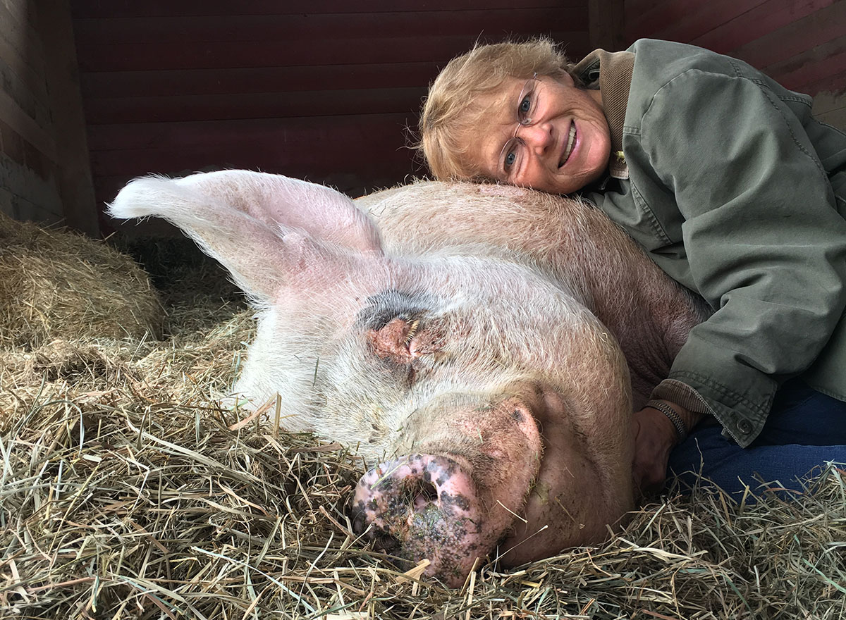 Judy with Judee the pig
