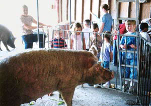 Libby greets children